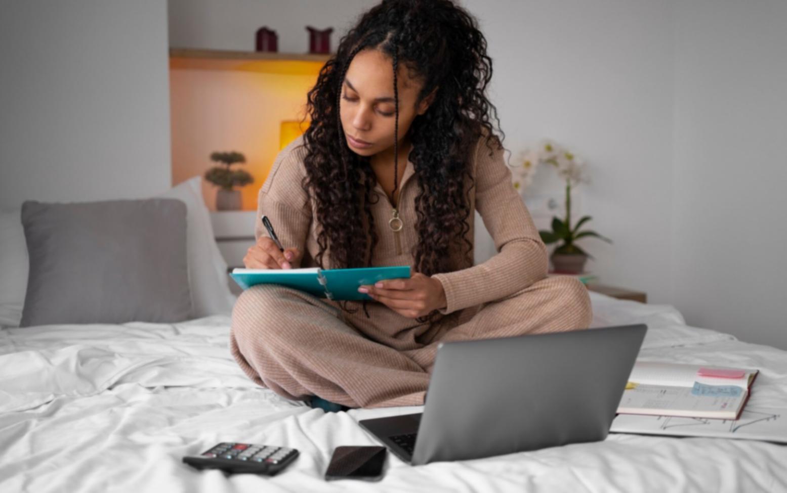 Financial education classroom with students working on budget planning exercises